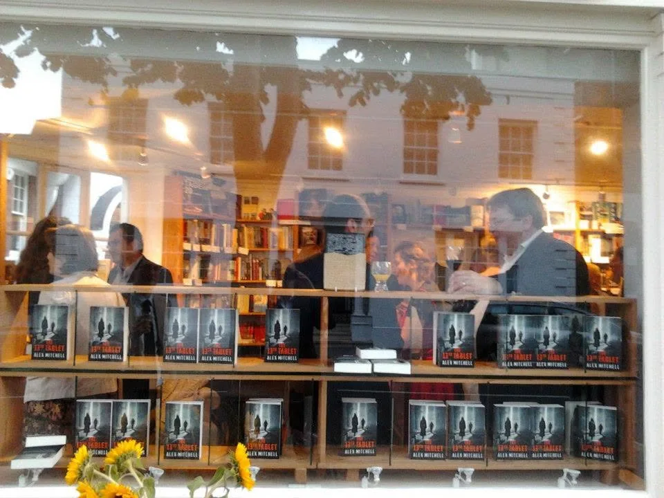 Copies of The 13th Tablet displayed in the Waterstones Brussels window